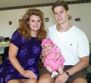 Angela and Ron Sharbino with baby Saxon Page